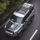 The PLUMB Black - Knight sliding - rail cross - bar roof luggage rack and luggage box kit for the new Land Rover Defender 110.